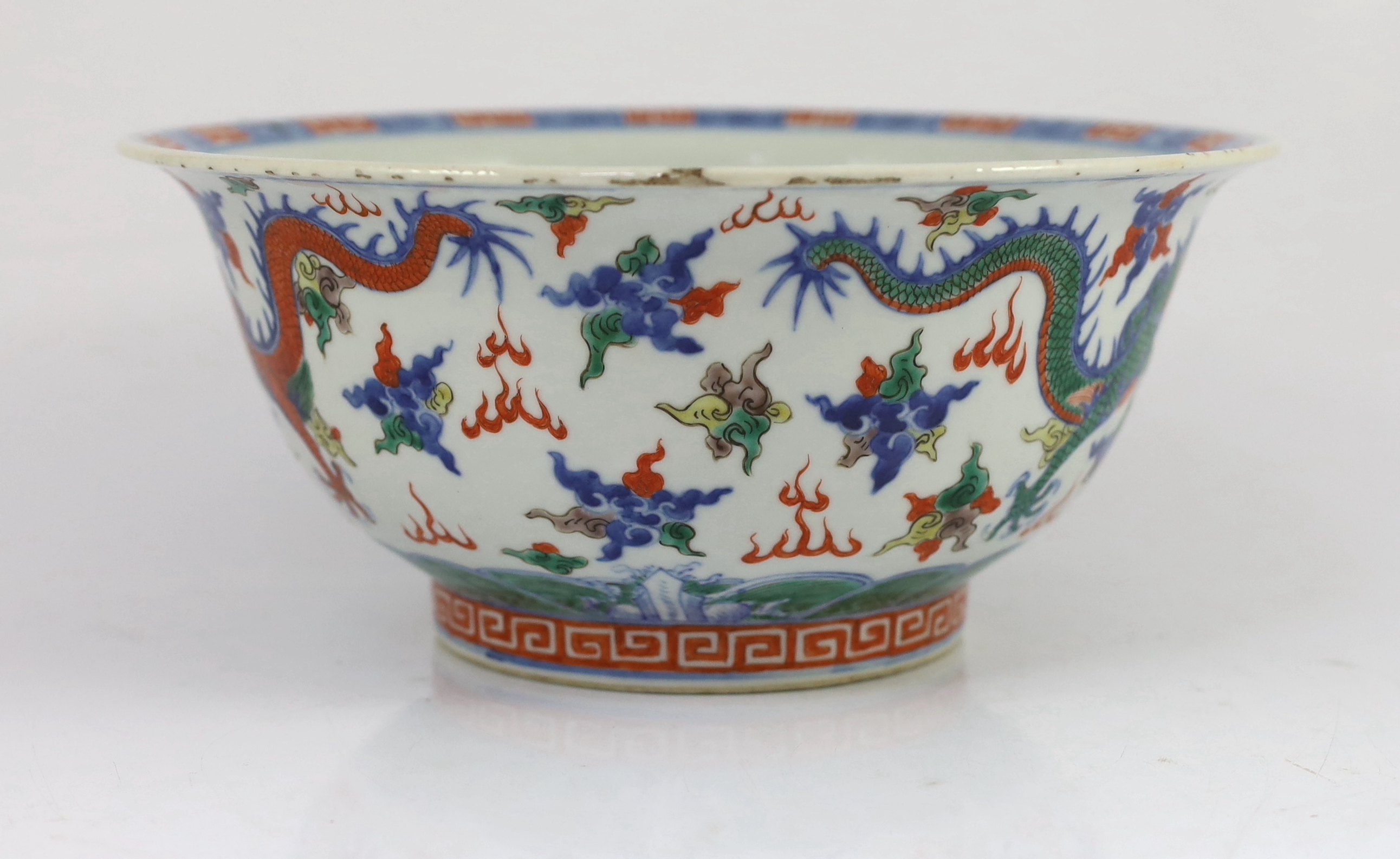 A Chinese doucai 'dragon' deep bowl, 19th century, small chip and glaze losses to rim
